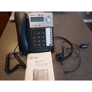 AT & T Two - line Corded phone with Caller ID with user manual and headset EUC